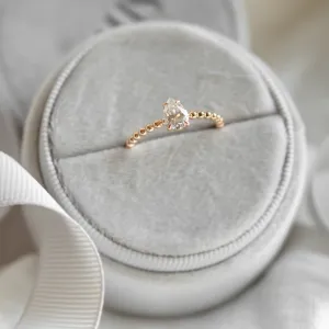 Gold engagement ring with beaded ball setting and pear moissanite BEAU Thumbnail