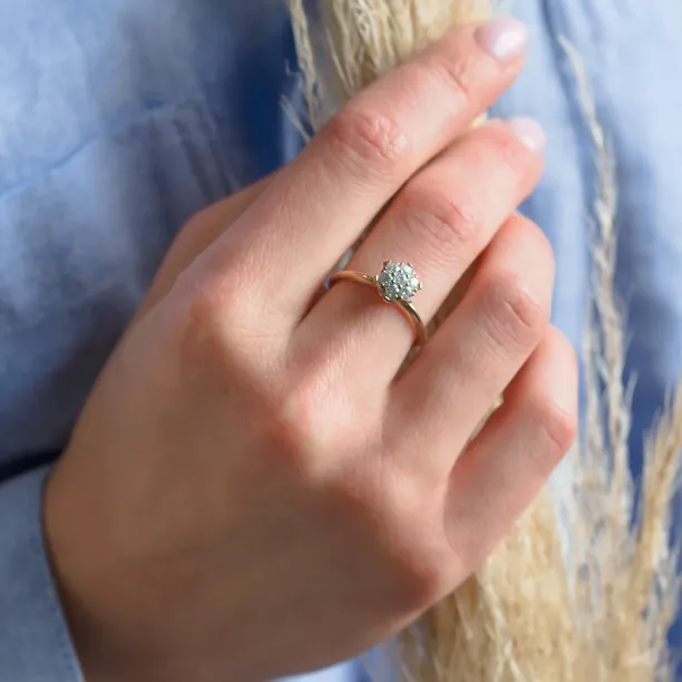 AUDREY gold ring with pavé moissanites worn on the hand