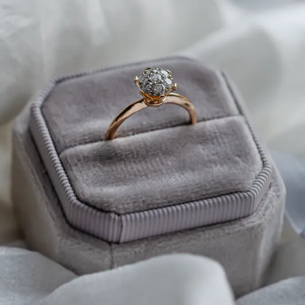 AUDREY gold ring with pavé moissanites showing the raised setting
