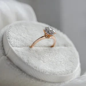 Angled detail of the AUDREY gold ring with pavé moissanites