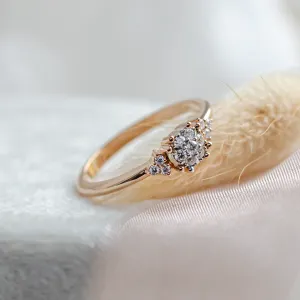 Close-up of the gold BOOGIE engagement ring with pavé moissanites