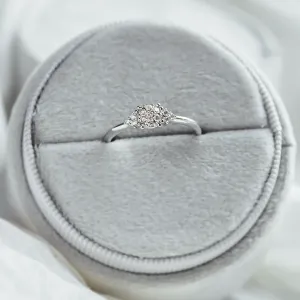 Full view of the gold BOOGIE engagement ring with pavé moissanites