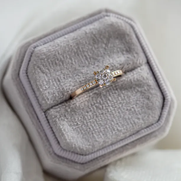Pavé gold ring with moissanites shown from above