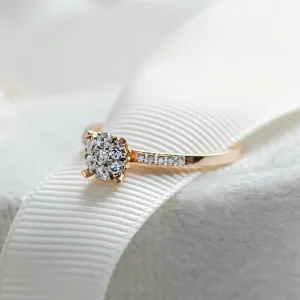 Angled close-up of the LOLA pavé gold ring with moissanites