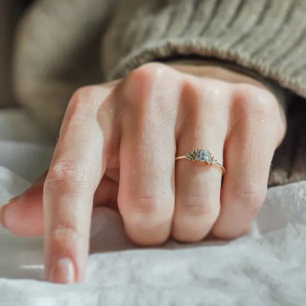 BOWIE pavé engagement ring with moissanites worn on the hand