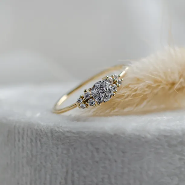 Angled close-up of the BOWIE pavé engagement ring with moissanites
