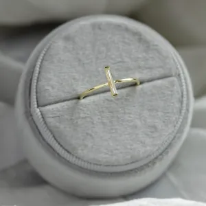 Angled view of the minimalist PERCY ring with baguette moissanite