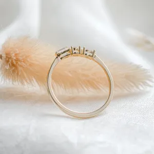 AVELA gold ring showing the inner surface and diamond settings