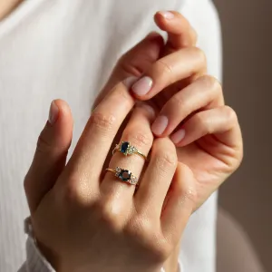VAIANA gold rings with blue and white lab-grown diamonds worn on adjacent fingers