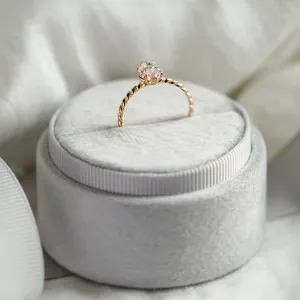 Gold twisted rope ring DAHLIA with a marquise-cut moissanite