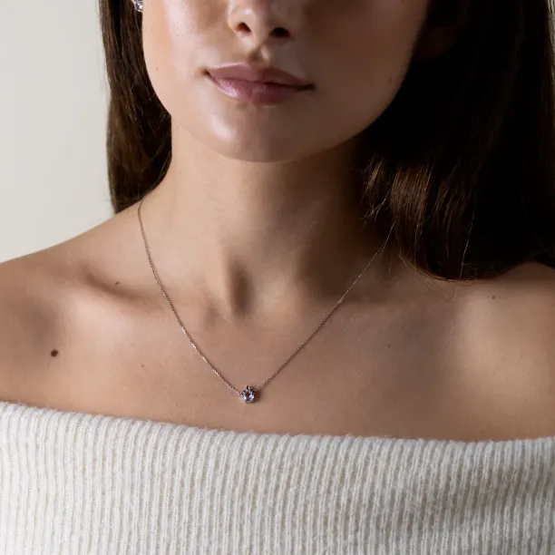 BELLASIN aquamarine and salt and pepper diamond necklace worn on the neck
