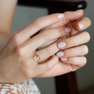 Red garnet MERIDAL ring worn on the hand