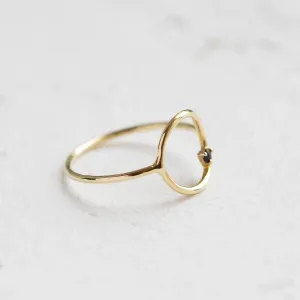 Angled view of the minimalist red garnet MERIDAL ring