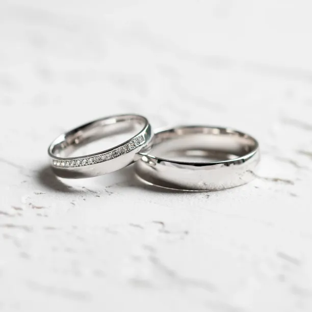 TRADITION his and hers wedding rings, including a diamond-set women's ring