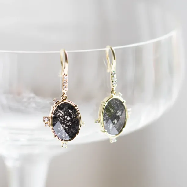 MARIBEL dangling earrings with oval salt and pepper diamonds shown hanging from their hooks