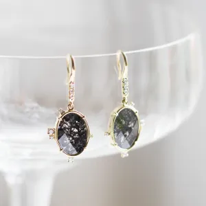 MARIBEL dangling earrings with oval salt and pepper diamonds shown hanging from their hooks