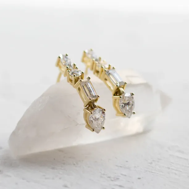 Angled close-up of the MARINA moissanite earrings