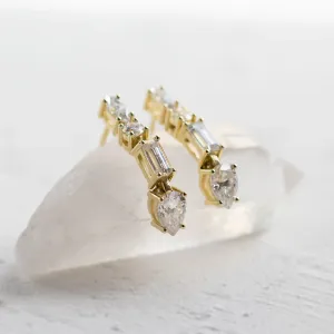 Angled close-up of the MARINA moissanite earrings