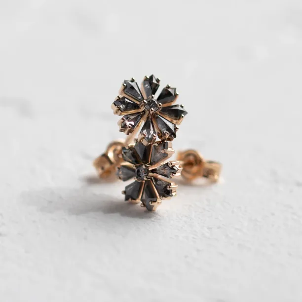 Close-up of FLOWER floral earrings with salt and pepper diamonds