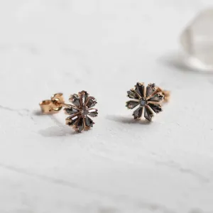 FLOWER floral earrings with salt and pepper diamonds in an angled view