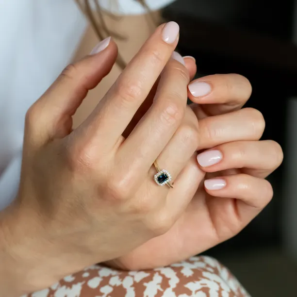 MILLIE lab-grown diamond engagement ring worn on a hand, close-up