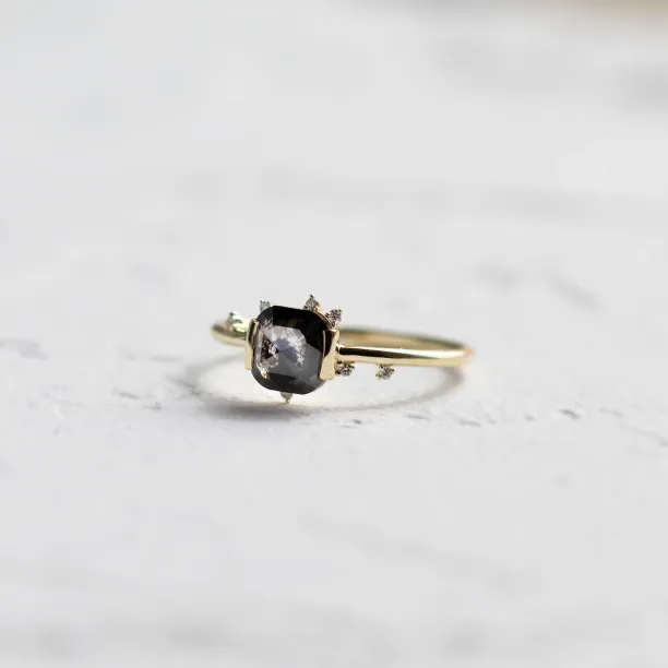 Front view of the WINNIE cluster ring with a salt and pepper diamond