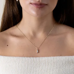 FELIANA pendant necklace with baguette moissanite and diamond worn on the chest