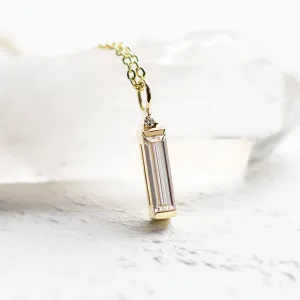 FELIANA gold pendant necklace with baguette moissanite and a small natural diamond