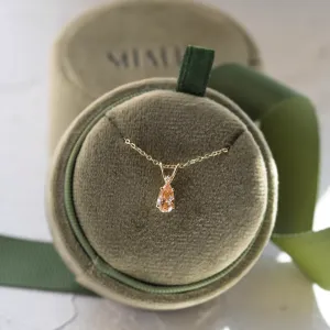 Full view of the gold SOLARIS pendant with orange lab-grown diamond