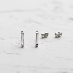 FELICIS moissanite and diamond earrings with their earring backs visible