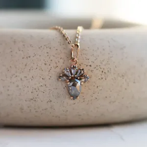 Close-up of the LONIA pendant with faceted salt and pepper diamonds