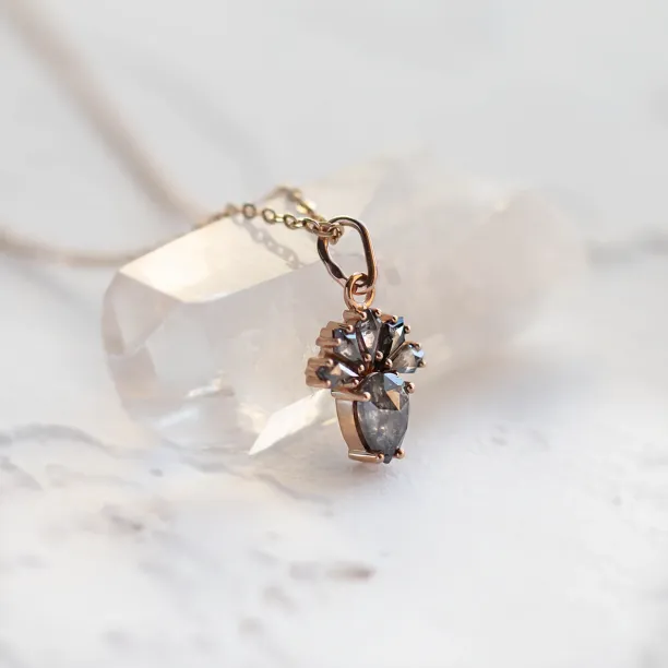 Side view of the LONIA pendant with salt and pepper diamonds