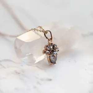 Side view of the LONIA pendant with salt and pepper diamonds