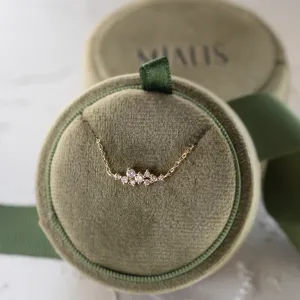 KLAREEN lab-grown diamond cluster necklace displayed on a cushion
