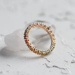 Underside view of the MOSAIC ring with colorful sapphires