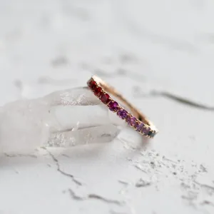 Angled close-up of the MOSAIC rainbow sapphire ring with colorful sapphires