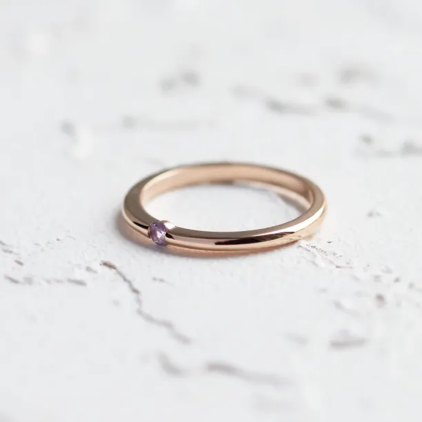 Angled view of the HAIMEE lavender sapphire ring