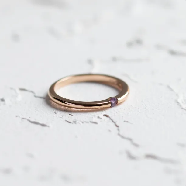 Angled close-up of the HAIMEE lavender sapphire ring