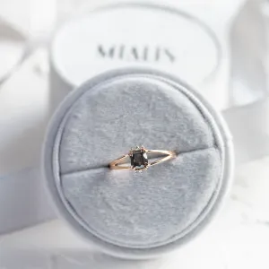 SALOMINA ring showing its asscher-shaped salt and pepper diamond and split band