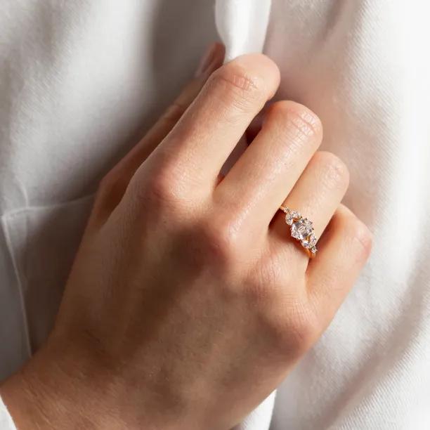 CAIRA lab-grown diamond engagement ring worn on the hand