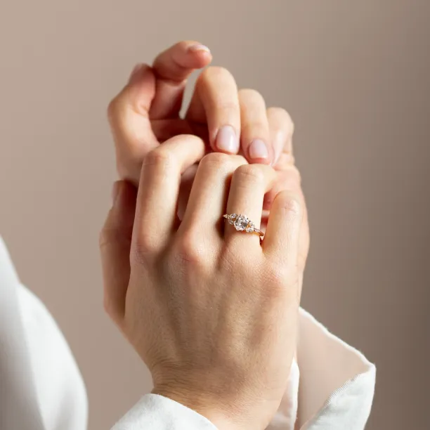 CAIRA engagement ring with lab-grown diamonds worn on the hand