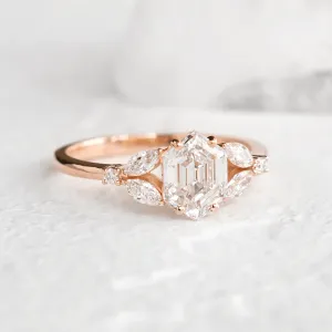 CAIRA lab-grown diamond engagement ring with a rectangular center stone and side diamonds
