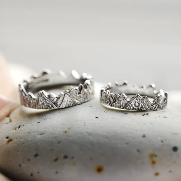 Pair of MONTE platinum mountain-inspired wedding rings