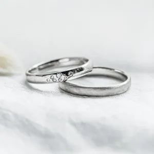 LEOS matte and shiny platinum wedding rings with diamonds