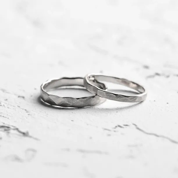 ETA matte platinum wedding bands with hammered surfaces