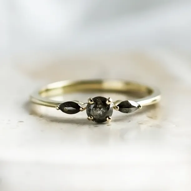 Angled view of salt and pepper diamond ring RINA