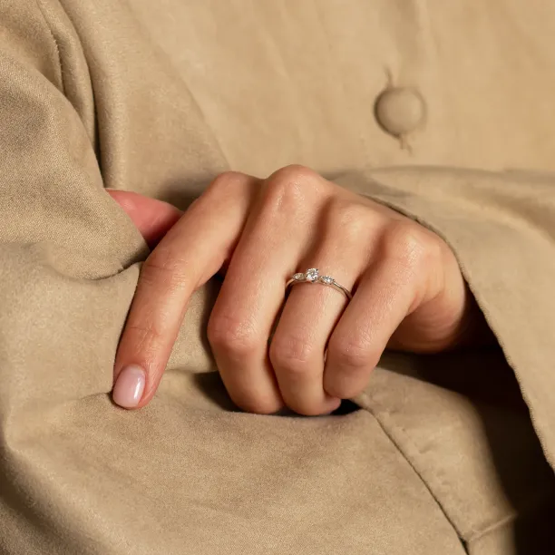 Diamond engagement ring DARA worn on a finger