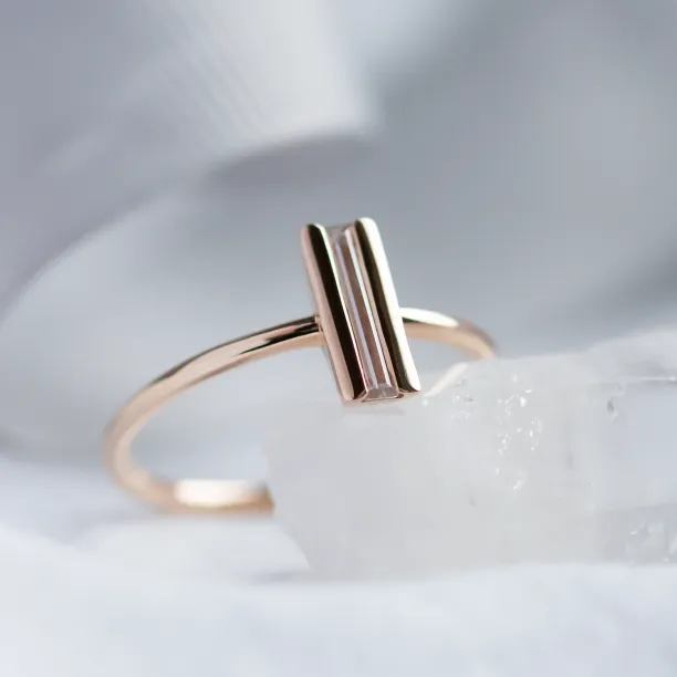 Angled close-up of the KATY baguette moissanite engagement ring