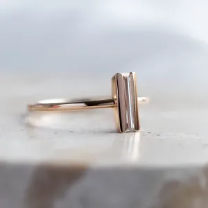 Side profile of the KATY engagement ring with a baguette moissanite