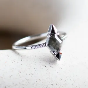 Angled close-up of the KYLEEN salt and pepper diamond engagement ring
